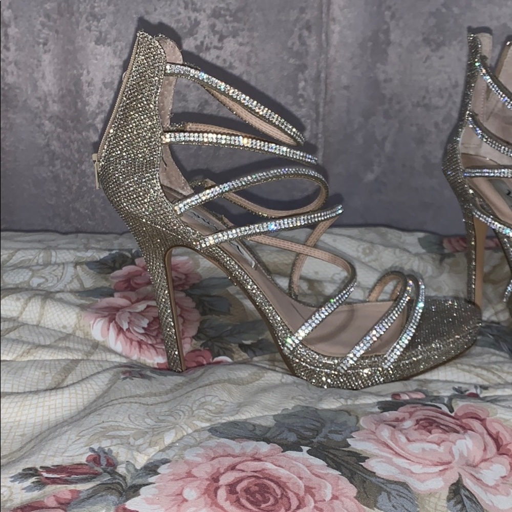 Silver sparkly high heels. WORN ONCE